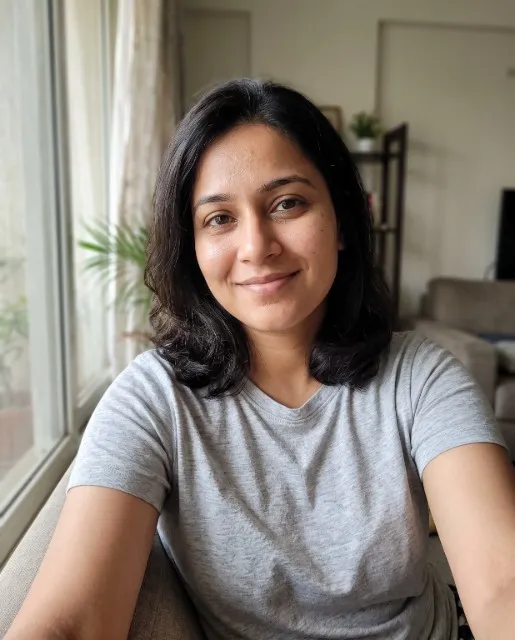 A small 640-pixel copy of a selfie (an AI-generated person)